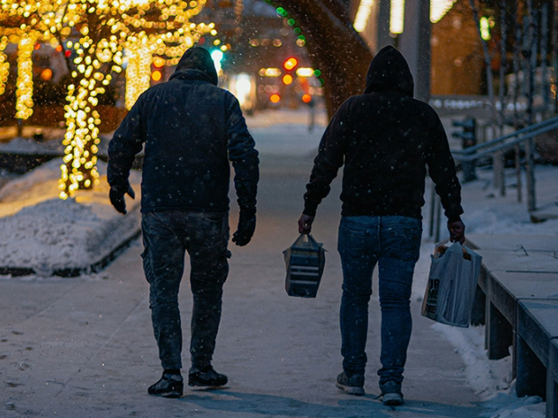 Men walking in the snow.
