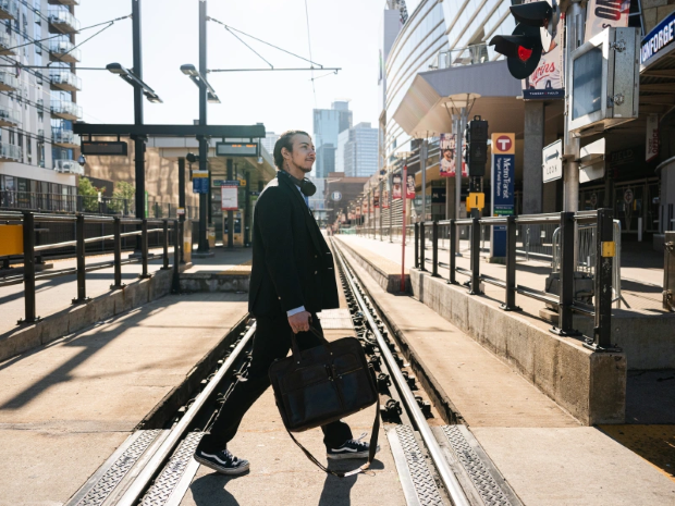 A person walks near a LRT station.