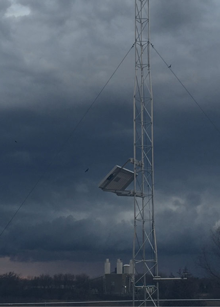 Hennepin County Mesonet station with storm in background