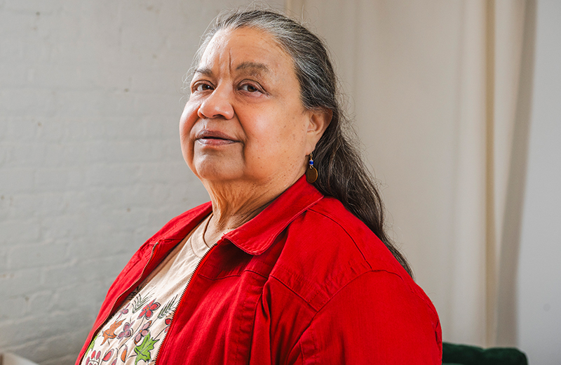women in red shirt standing