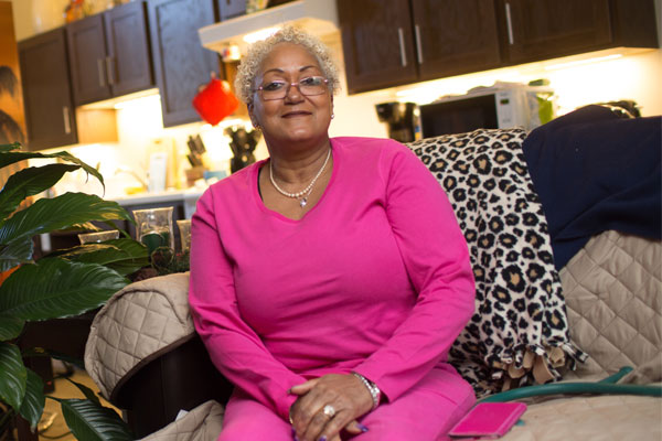 women sitting on couch