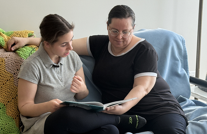 women reading on couch